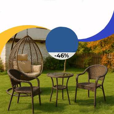 Outdoor furniture set with a swing chair, two chairs, and a table on grass.