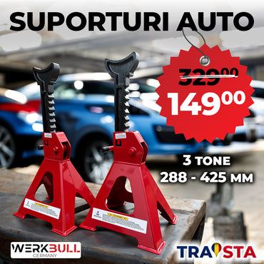 Two red car jack stands with a price tag and branding on a blurred background of cars.